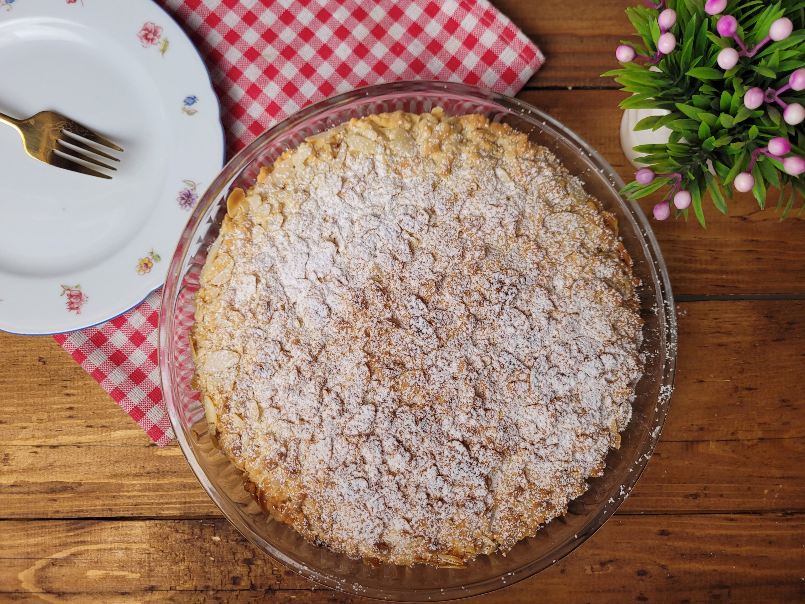 Homemade apple crumble pie on a wooden table