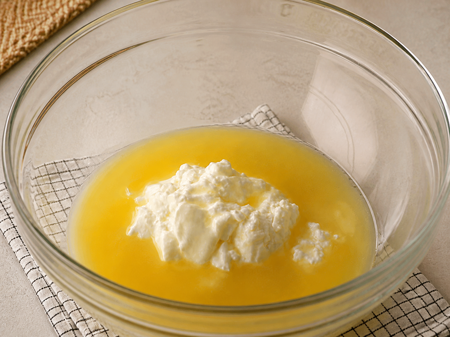 Butter, yogurt, oil, and sugar combined for the apple pie dough
